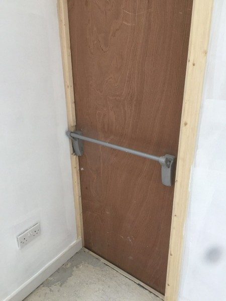 A fire exit panic bar fitted upside down!
